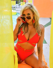 Nice mature woman pics of busty blond in red bikini