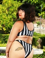 Chubby Asian mature shows her hairy pussy outdoors