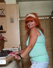 Older women pictures of mature redhead in kitchen